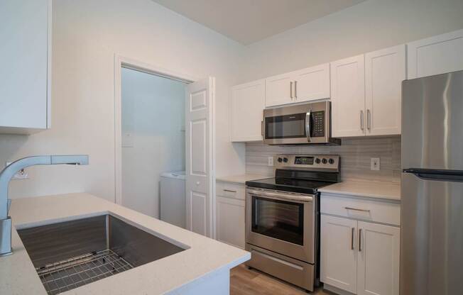 Chef-Inspired Kitchens Feature Stainless Steel Appliances at Arboretum at South Mountain, Phoenix