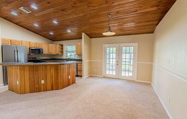 Beautiful 3/2/2 with Screened Porch & Large Fenced Yard