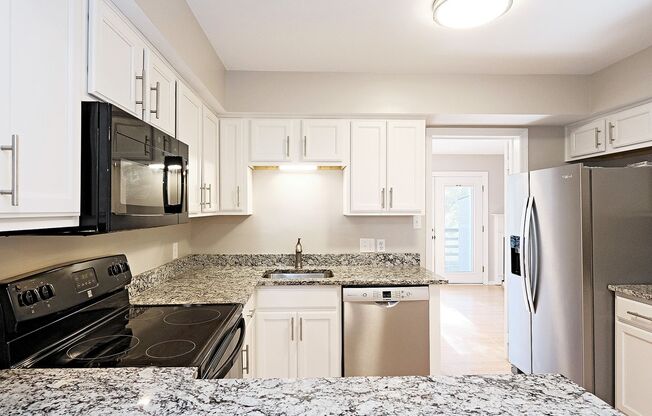 Move-in Ready End-Unit Stonehenge Townhome