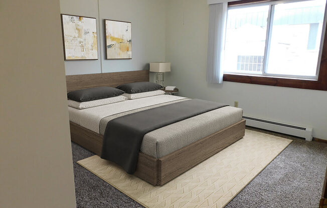 bedroom with natural light in heritage manor apartments