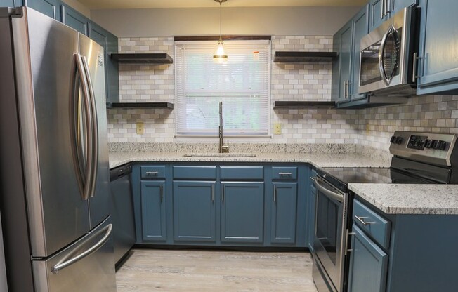 Available Early July! Renovated 3 bedroom Duplex close to Duke!