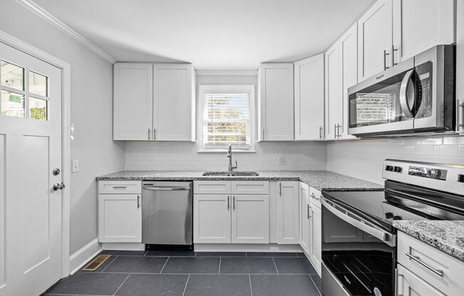 Available Early August! - Charming 2-Bedroom Durham Gem: Hardwood Floors, Updated Kitchen, and More!