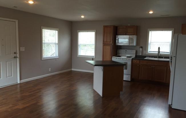 Charming 2-Bedroom Home with Porch & Storage Space