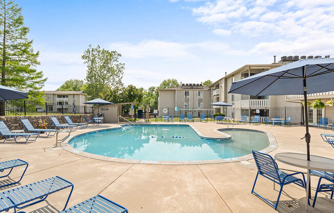 our apartments have a resort style pool and lounge chairs