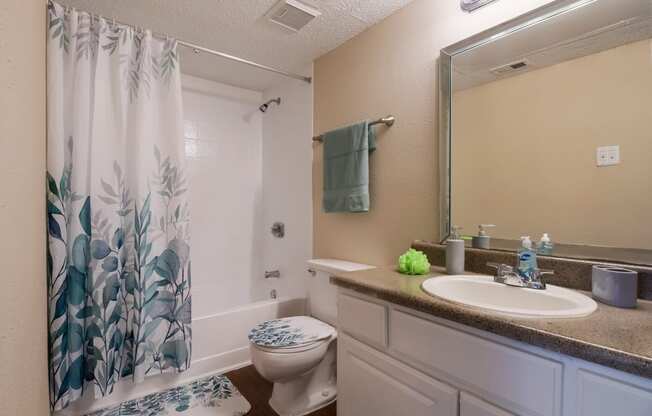Bathroom with a sink toilet and shower at The Glen at Highpoint, Dallas, TX, 75243