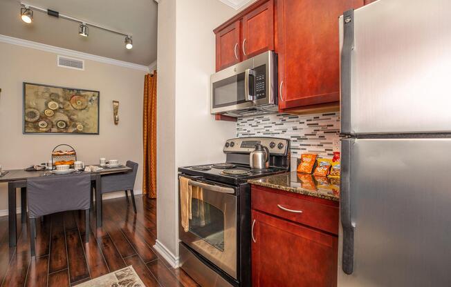 a kitchen with a stove top oven sitting inside of a refrigerator