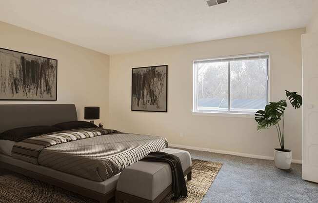 A bedroom with a bed, two pillows, a carpet, a potted plant, and two pictures on the wall.