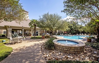 Lush landscaped courtyards with lounge areas.