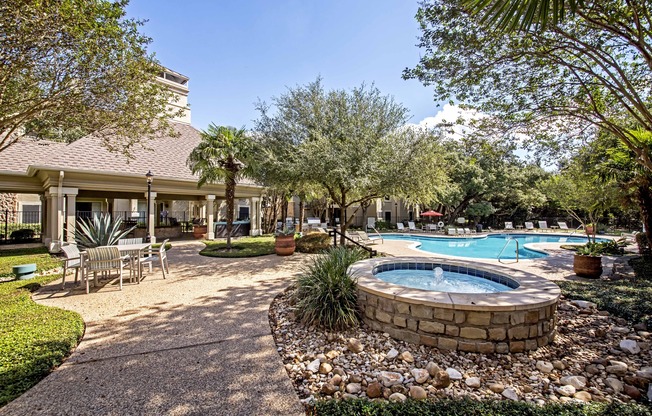 Lush landscaped courtyards with lounge areas.