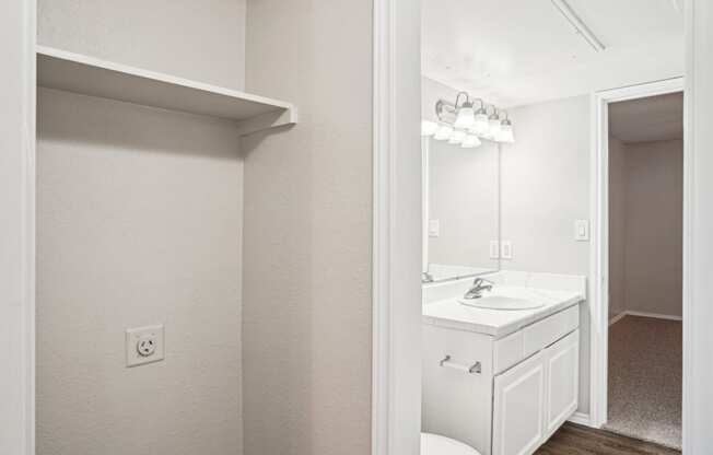 Unfurnished A4 floor plan white bathroom with a sink and a mirror Noel on The Parkway in Dallas, TX