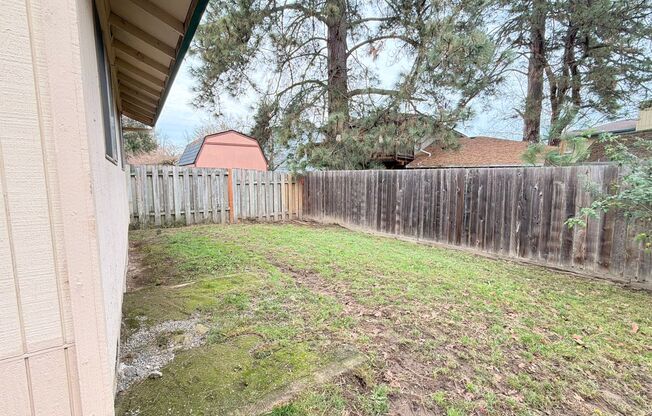 Comfortable Beaverton Home with AC, Fireplace, Large Fenced Yard, Spacious Garage and W/D!