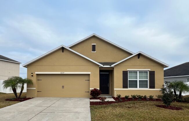 Modern 4 bed/2 bath home with brand-new flooring!