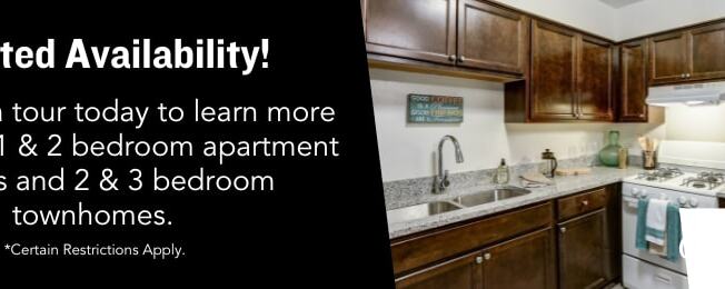 A kitchen interior with a sign that says "Limited Availability! Schedule a tour today to learn more about our 1 & 2 bedroom apartment homes and 2 & 3 bedroom townhomes."