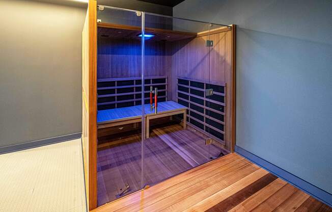 3thirty3 new rochelle ny apartment high rise photo of infrared sauna with teak wood and glass doors next to fitness center