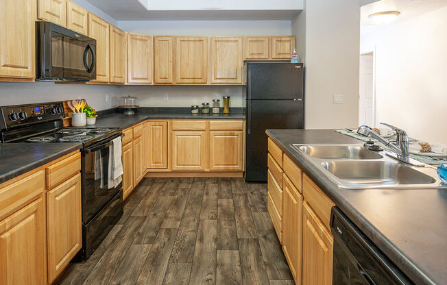 Spacious Kitchen With Pantry Cabinet at Four Seasons at Southtowne Apartments, South Jordan, UT