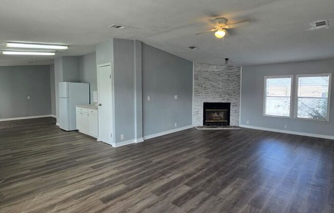 Newly renovated 4/3 property with fenced in yard!