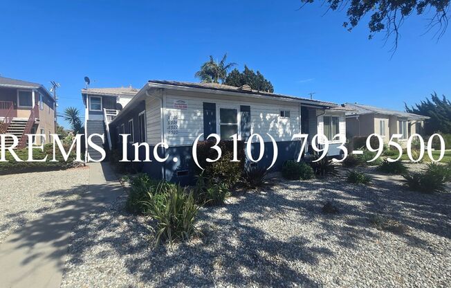 1 Bedroom Downstairs Apartment w/ (Shared) Garage Parking