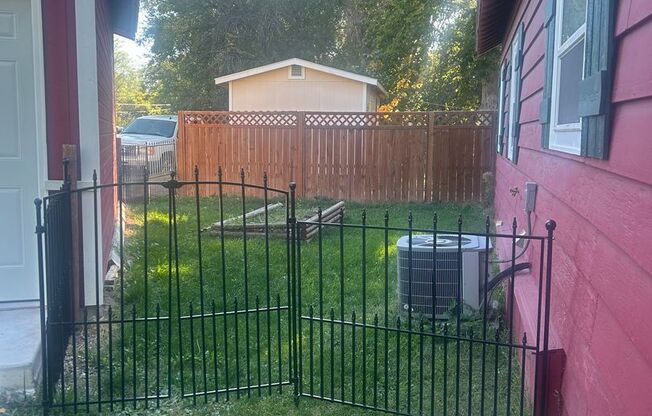 Charming Furnished 1BR Home with Garage & Yard – Country Feel in the City