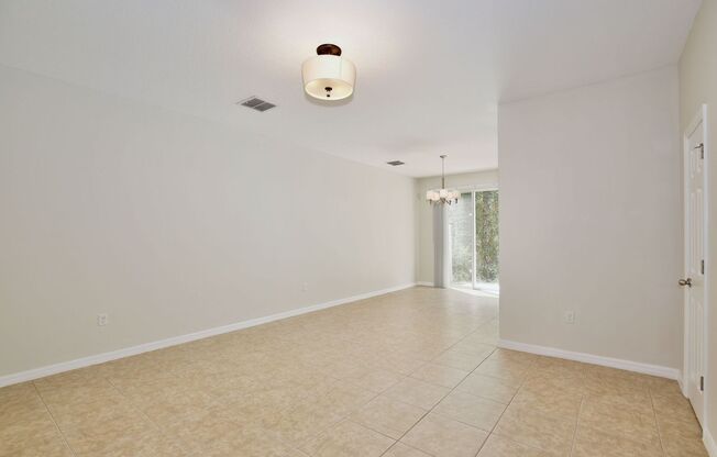 Stylish 3/2.5 Townhome with Open Floor Plan, Garage & Patio in Gated Community