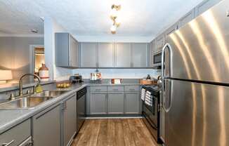Efficient Appliances In Kitchen, at Crestmark Apartment Homes, Lithia Springs, 30122