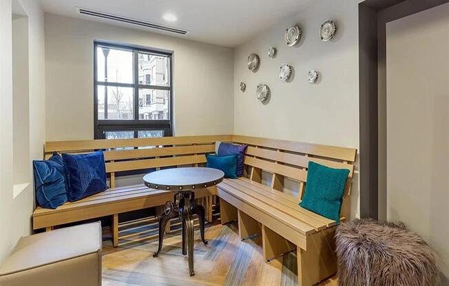 a dining room with a wooden bench and a table