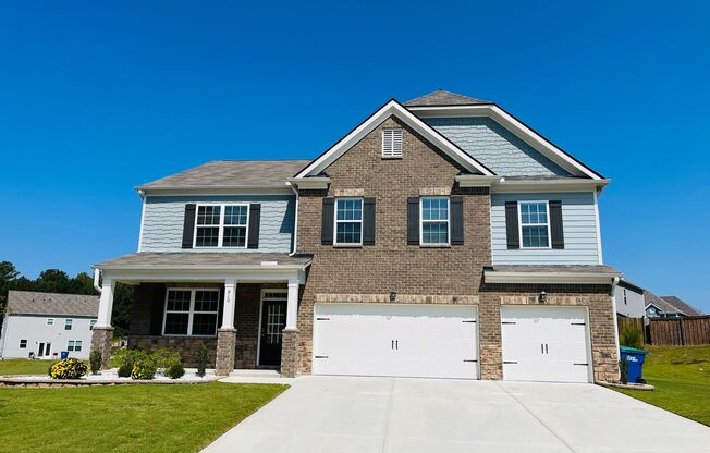 WOW! 5 bedrooms, 4.5 baths with a guest bedroom and full bath on the main floor. Must see!