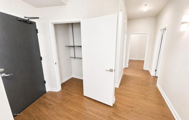 Spacious redesigned closet with built-in shelving.