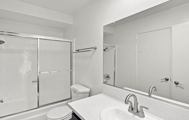 Modern styled bathroom with shower and tub.