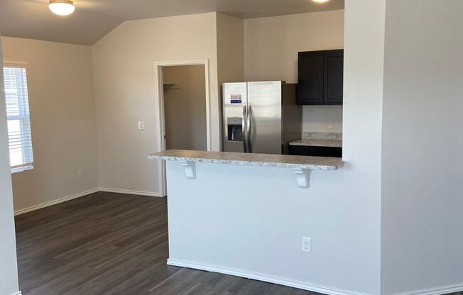 *Pre-leasing* Three Bedroom | Two Bathroom Home in Mustang Farms