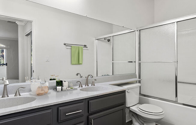 Modern styled bathroom with shower and tub.