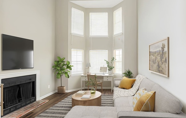 well furnished living room with high ceilings and large windows in a Gallatin apartment at Littlestone