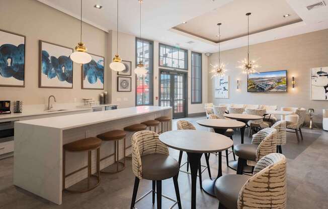 A modern kitchen with a bar area and dining area. at Harbor Pointe, New Jersey, 07002