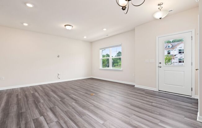 Like-New Townhome Walk to Downtown | Garage + Internet Included