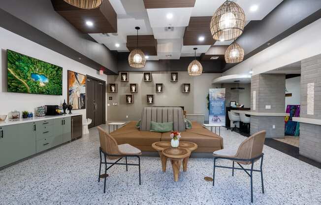 A modern living room with a dining table and chairs.