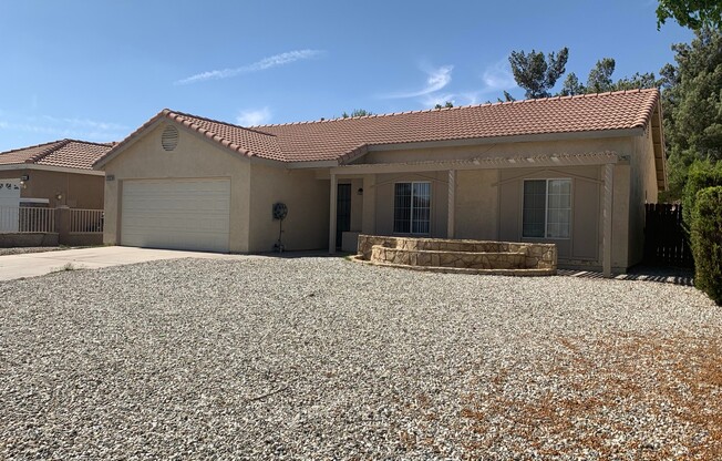 Adelanto Home- 3 Bedrooms, 2 Bathrooms, Laminate Floors, Large Back Yard