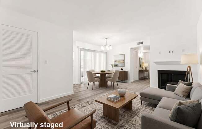 A living room with a fireplace and a couch.