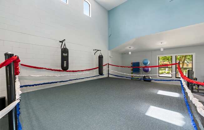 the weights room at the preserve at great pond apartments in great pond wi