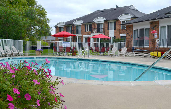 Swimming Pool with Lounge Chairs at French Quarter Apartments,Southfield,48034