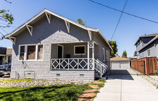 Charming 2 Bedroom House with Expansive Workshop Garage