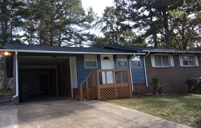 Fully Renovated 3 Bedroom 2 Bath Brick Ranch with Carport and Wired Storage Building