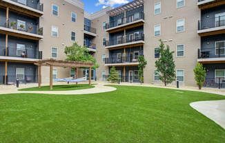 large green yard and a hammock at The Vue Luxury apartments in Indianapolis