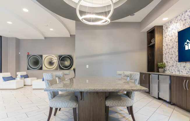 a dining room with a table and chairs