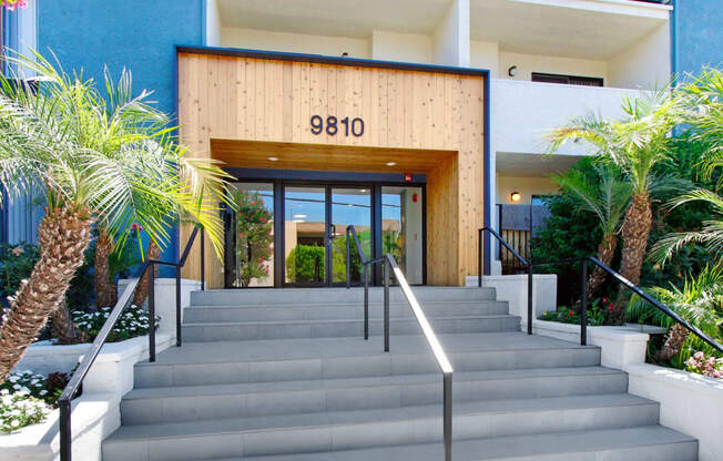 the facade of a building with a staircase in front of it