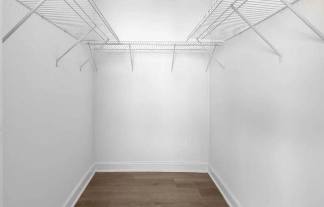 a room with white walls and a wood floor