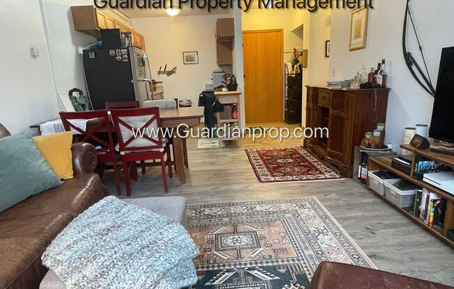 Northeast Renovated Corner Unit Main Floor, Parking, Very Bright, USI Connected