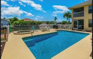 Gulf access canal View with Dock 3 Bedroom 2 Bath Furnished Condo Community Pool and Spa no pets