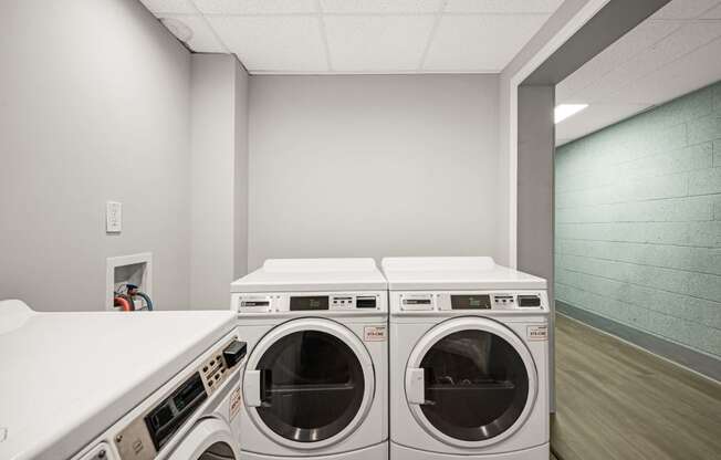 the preserve at ballantyne commons laundry room with washer and dryer