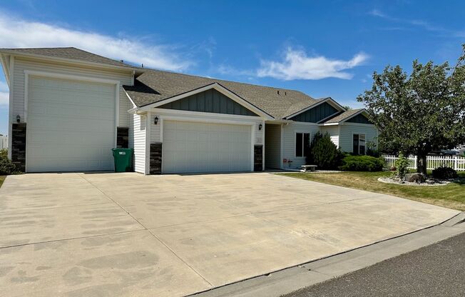 $500 OFF MOVE-IN SPECIAL! Beautiful 3 Bed 2 Bath Five Mile Rancher w/ Huge Attached 3rd Garage + Mezzanine and Fully-Fenced Yard!