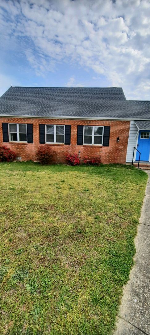 Remodeled 3 bedroom brick cape in Lakeside with huge back yard and detached garage.