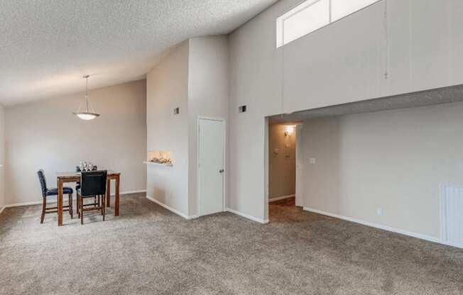 apartment with vaulted ceiling